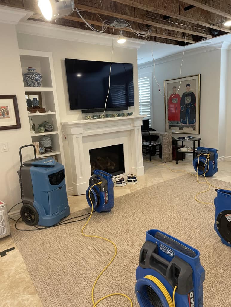 AC leak water damage Newport Beach ceiling staining from a condensate drainage failure