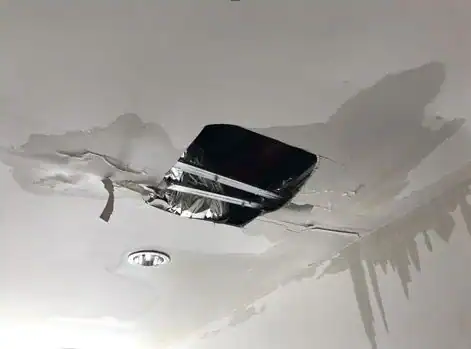 Ceiling water damage in Anaheim caused by AC leak moisture intrusion