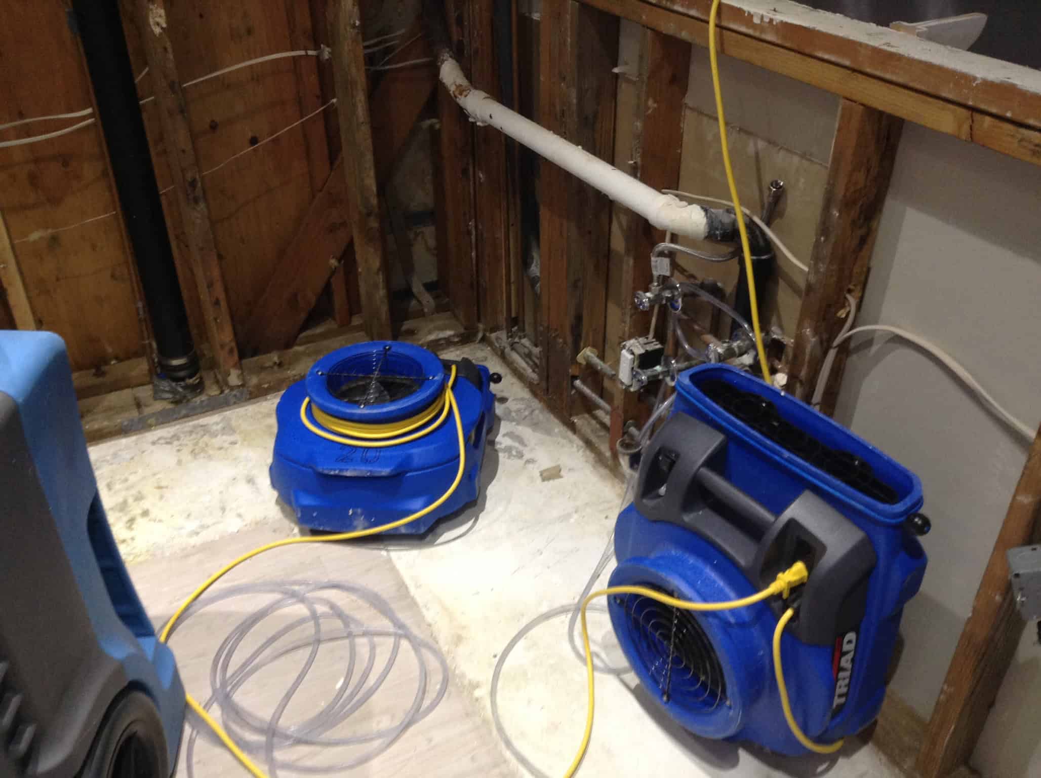 Containment and drying equipment during structural drying