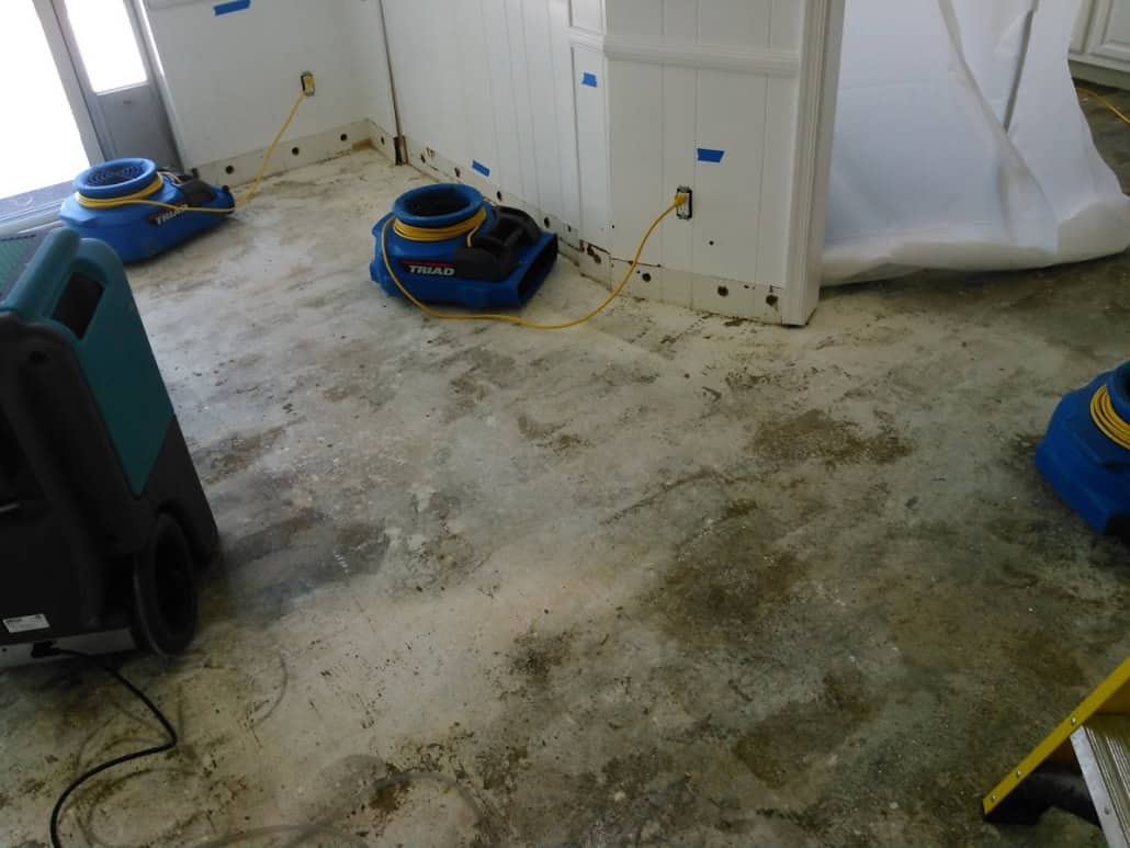 Structural drying equipment during emergency water cleanup in Newport Beach